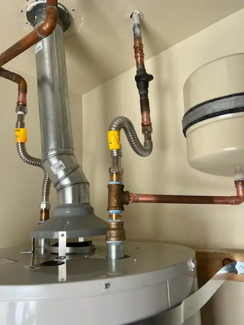 Water heater installation and plumbing repair in Cadillac Drive